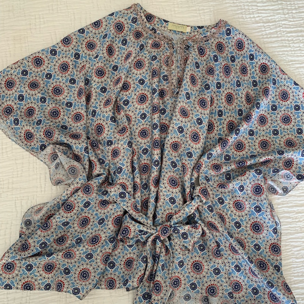 SOLD- Chic design, lovely blue blouse.